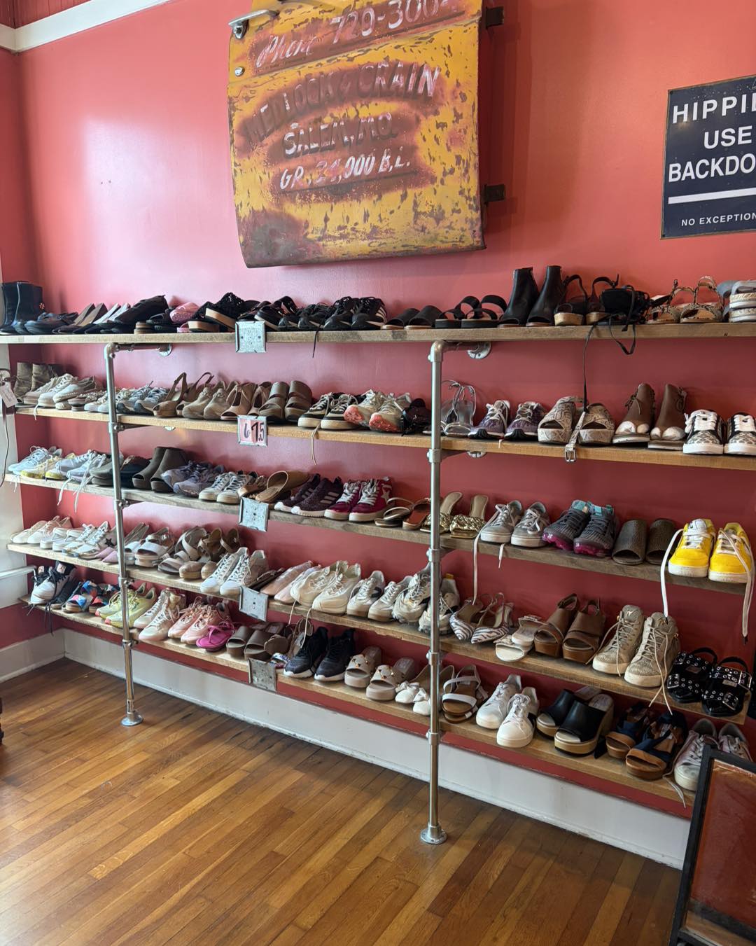 Wall of consigned shoes